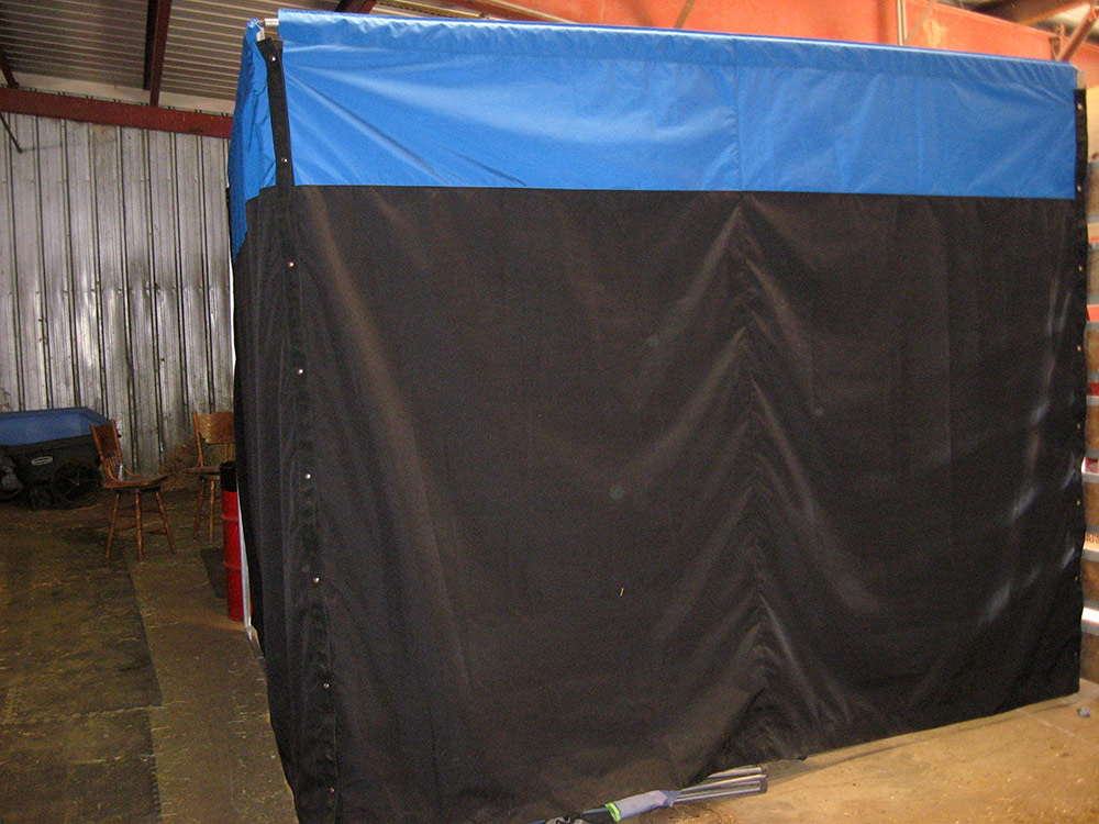 Show hut cover in black and blue by Rush Creek Originals custom ag products